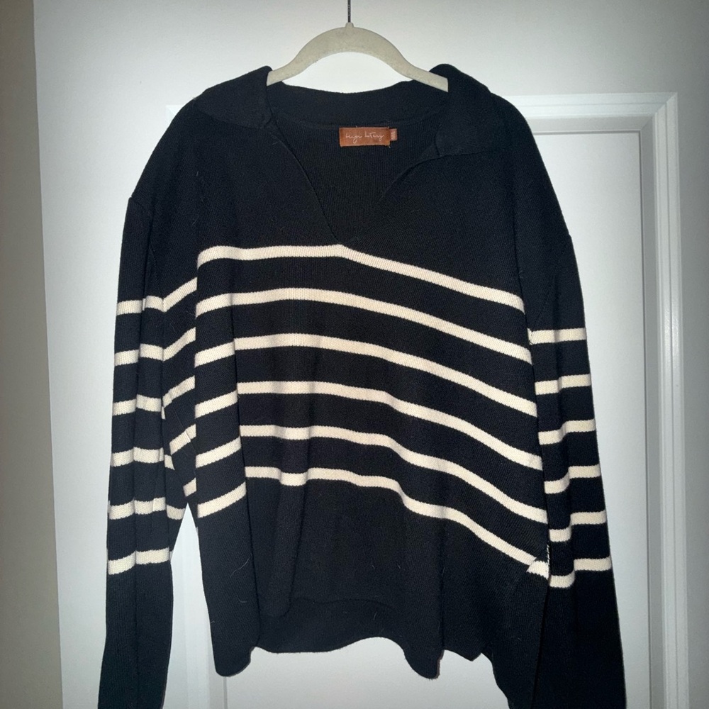 Elegant Black and Cream Striped V-Neck Sweater